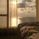 Apartment with sea view    Море за занавеской 